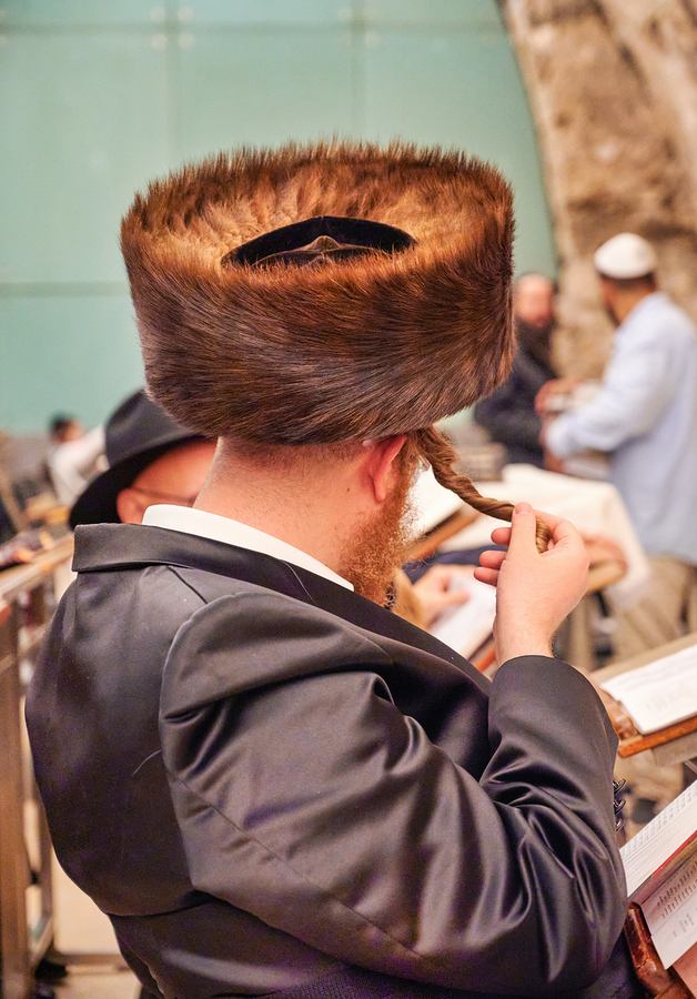 Orthodox Jews pray and read at the Wailing Wall in Jerusalem  Print