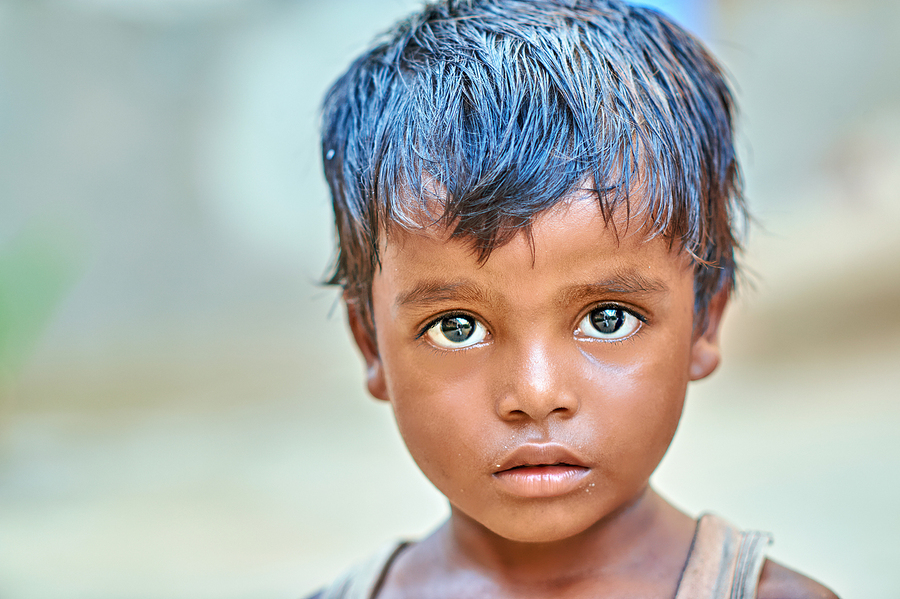 Portrait of a boy in Rajasthan India with a focused expression  Print