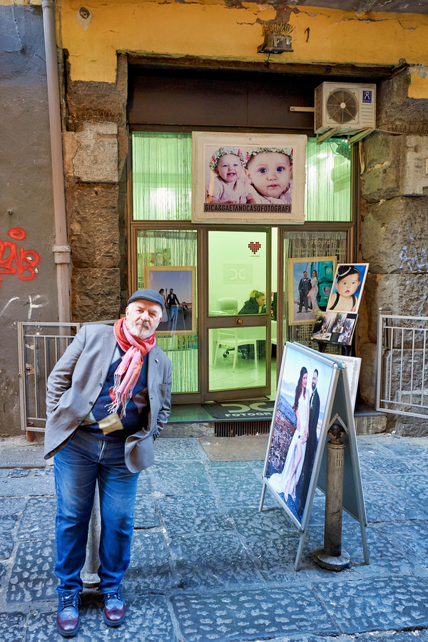 Domenico Caso stands in front of his workshop in Naples Campania  Print