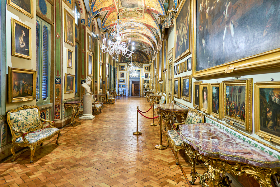 Visitors explore Doria Pamphilj Gallery in Rome Italy today  Print