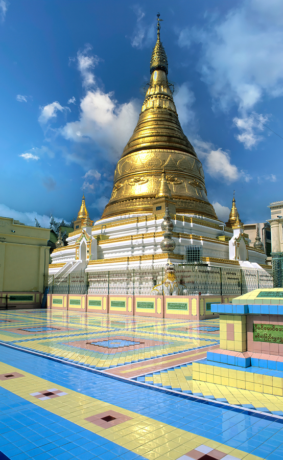 Golden stupa at Sagaing Paya in Myanmar under blue sky  Print
