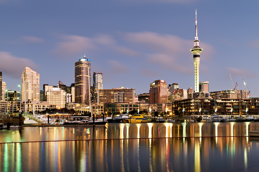 Auckland skyline with buildings and Sky Tower during evening  Print
