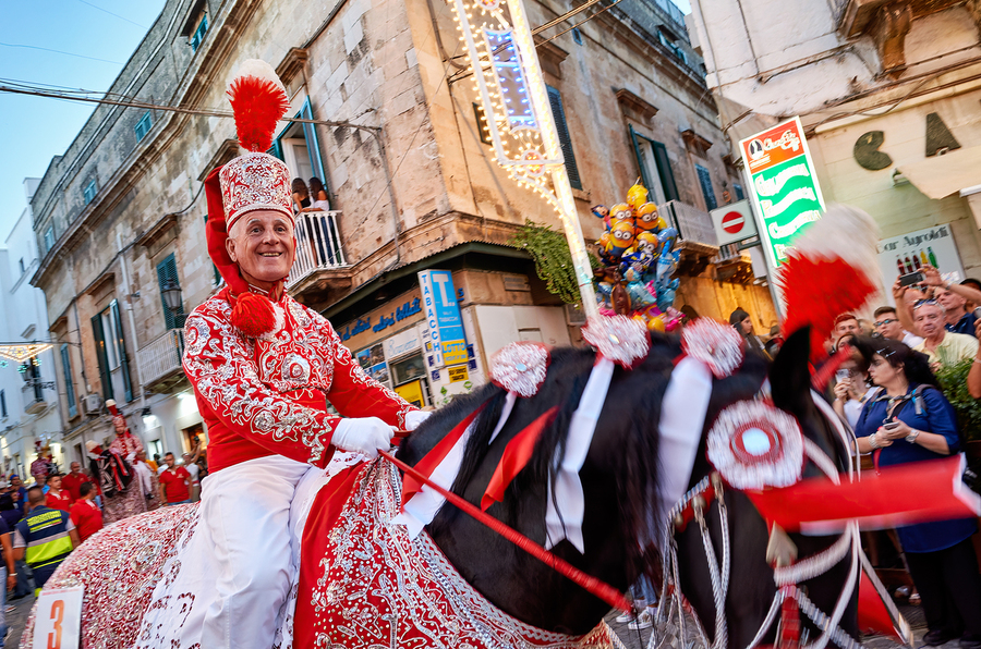 Apulia Puglia Italy. Ostuni. Festival of Saint Orontius. The cavalcata a procession of horses in the streets of the town  Print