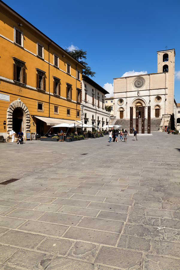 Todi Umbria Italy. Concattedrale della Santissima Annunziata. Cathedral. Piazza del Popolo. The statue Quattro Stele by Arnaldo Pomodoro  Print