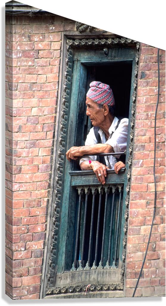Nepal. Kathmandu. Man at a window Canvas Print