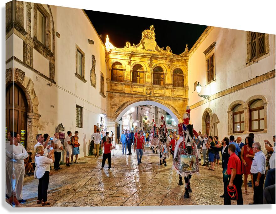 Apulia Puglia Italy. Ostuni. Festival of Saint Orontius. The cavalcata a procession of horses in the streets of the town Canvas Print