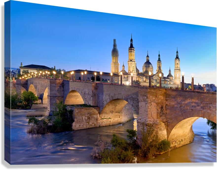 Zaragoza. Saragossa. Aragon. Spain. Cathedral Basilica of Our Lady of the Pillar and river Ebro at sunset Canvas Print