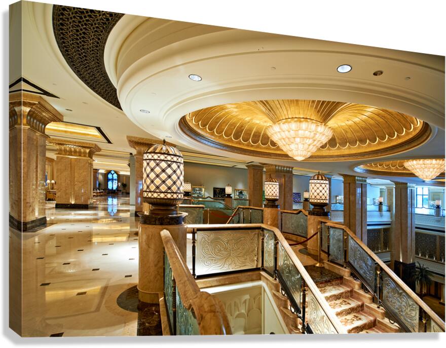 Opulent hotel lobby with grand staircase and golden chandeliers. Canvas Print