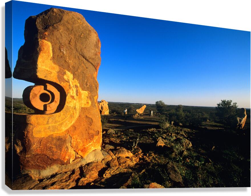 Sandstone sculptures glow at sunset in the Australian outback. Canvas Print