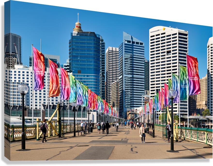 Colorful flags line bridge in Darling Harbour Sydney on a sunny  Canvas Print
