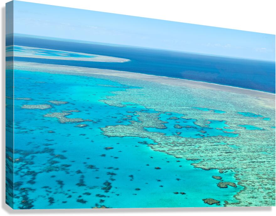 Aerial view of the Great Barrier Reefs turquoise waters. Canvas Print