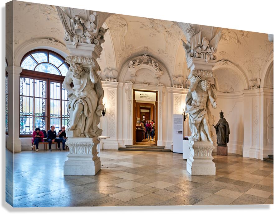 Ornate Baroque hall with sculptures and visitors. Canvas Print