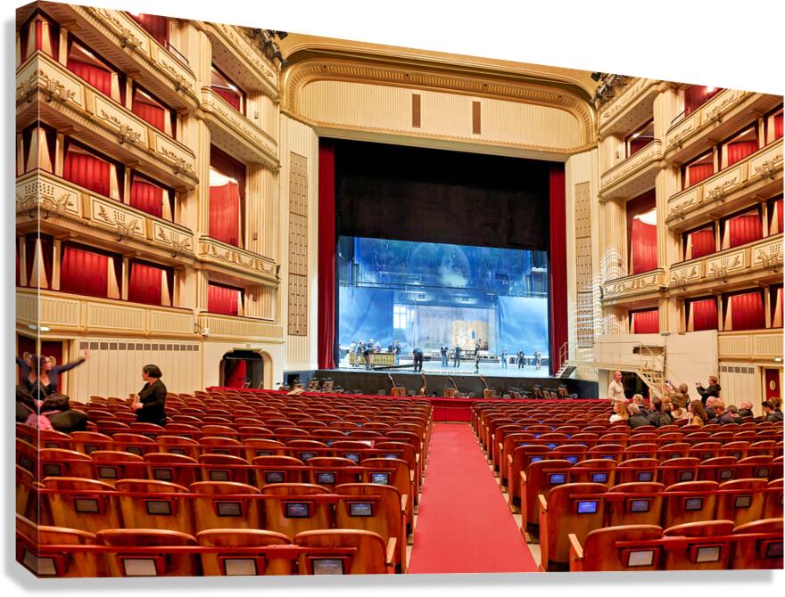 Ornate opera house interior with stage crew and audience. Canvas Print