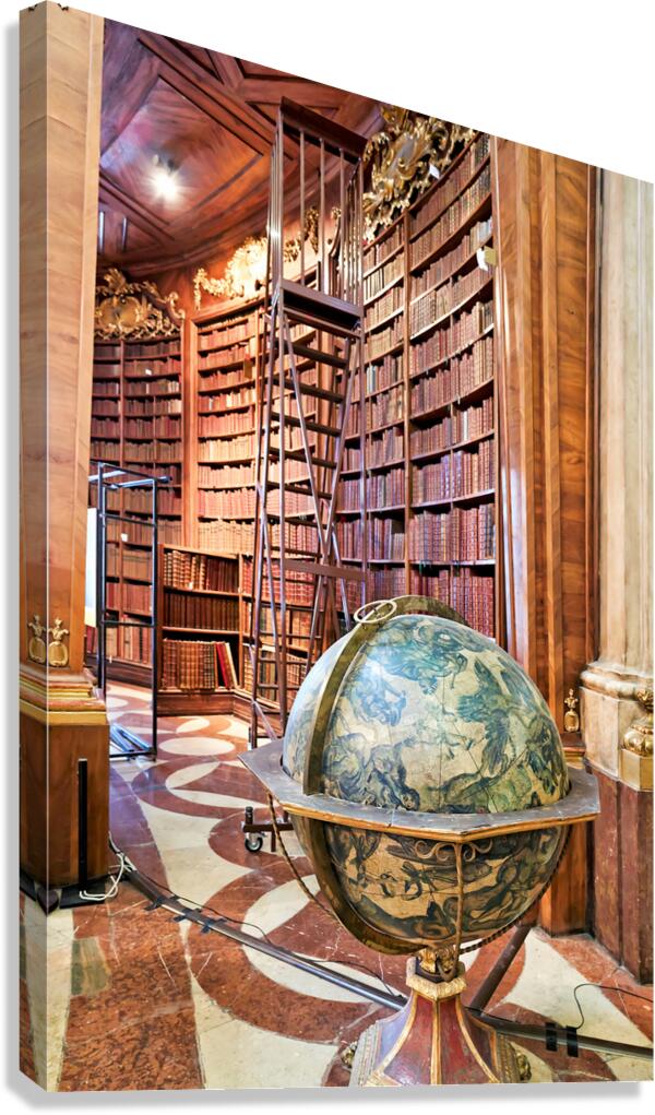 Historic library interior with globe books and rolling ladder. Canvas Print