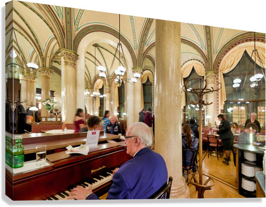 Man playing piano in an ornate bustling cafe. Canvas Print