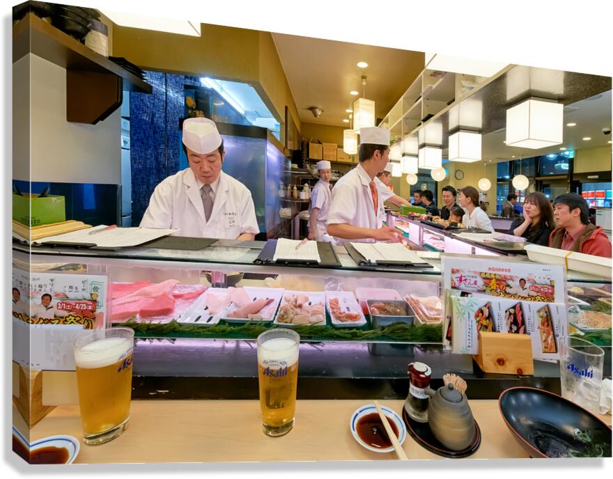 Sushi bar in Shibuya district with chefs and guests enjoying mea Canvas Print