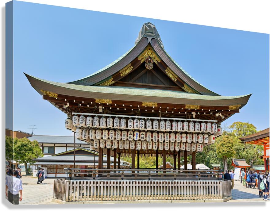Visitors admire Yasaka shrine in Kyoto during sunny day Canvas Print