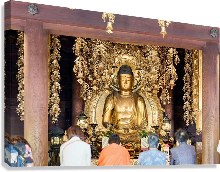 Buddha statue inside Chion in temple in Kyoto attracts many visi Canvas Print