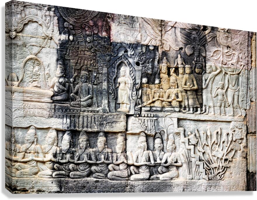 Ancient stone bas reliefs depicting figures and decorative eleme Canvas Print
