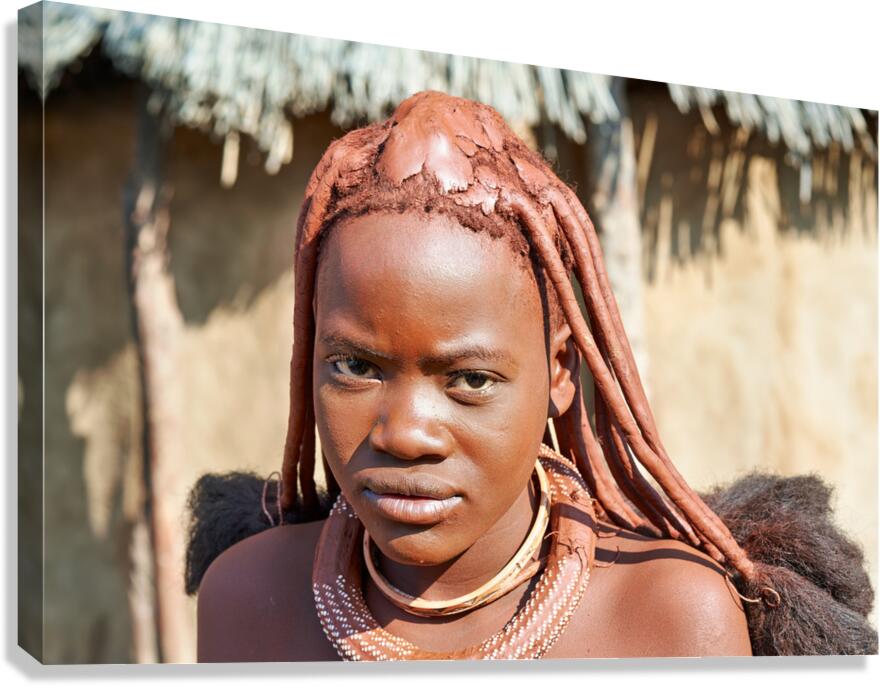 Himba woman in traditional hair headdress in Kunene Region of Na Canvas Print