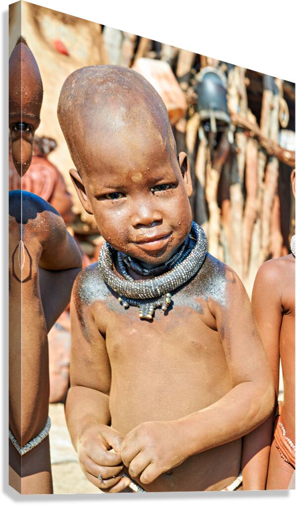 Portrait of child in Himba village in Kunene region of Namibia Canvas Print