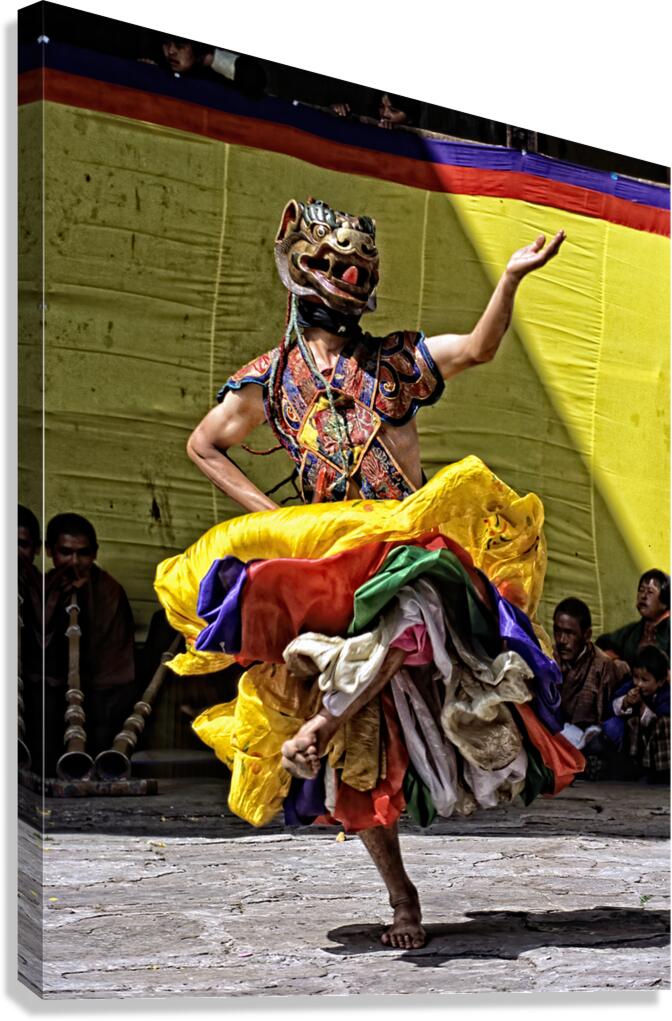 Vibrant masked dancer performs traditional dance. Canvas Print