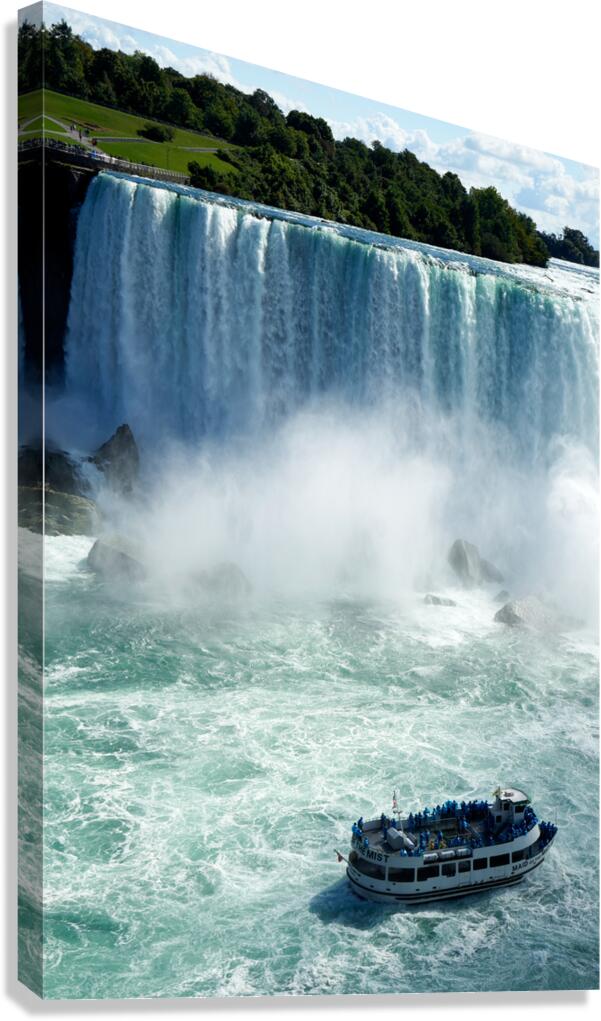 Maid of the Mist boat with tourists at Niagara Falls. Canvas Print