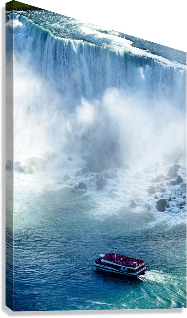 Tourists on a boat near Niagara Falls. Canvas Print