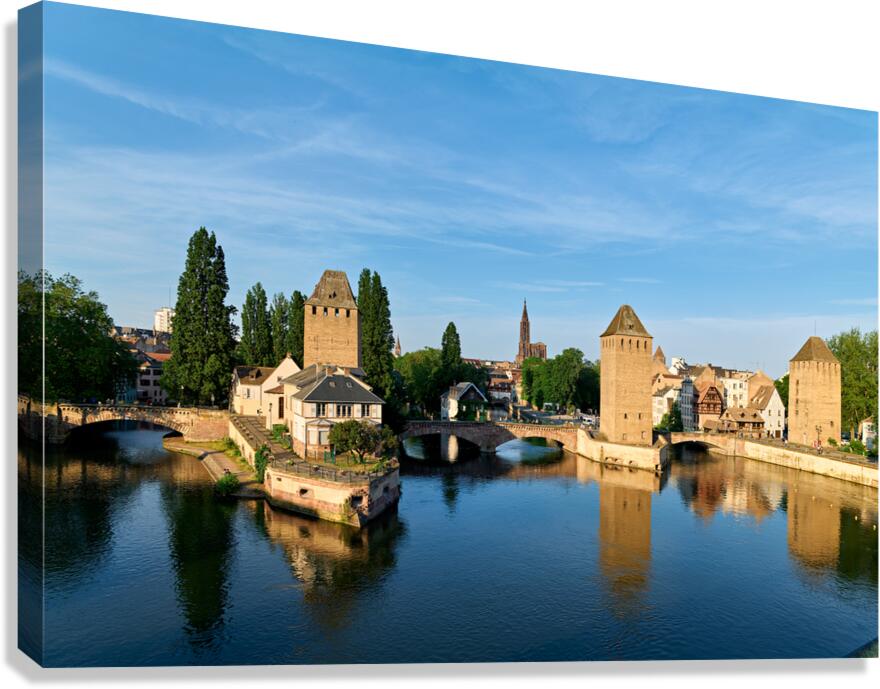 Covered bridges in Strasbourg by the river on a clear day Canvas Print