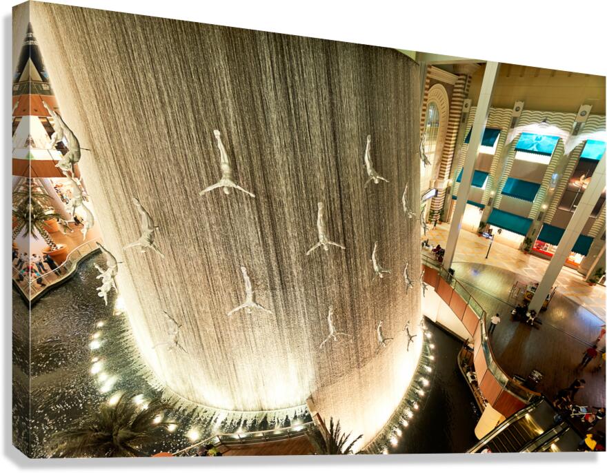 Diving sculptures at Dubai Malls waterfall showcase unique art Canvas Print