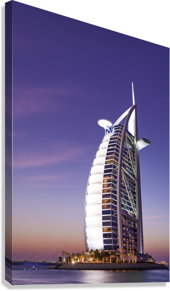 Burj Al Arab hotel illuminated at dusk in Dubai UAE Canvas Print