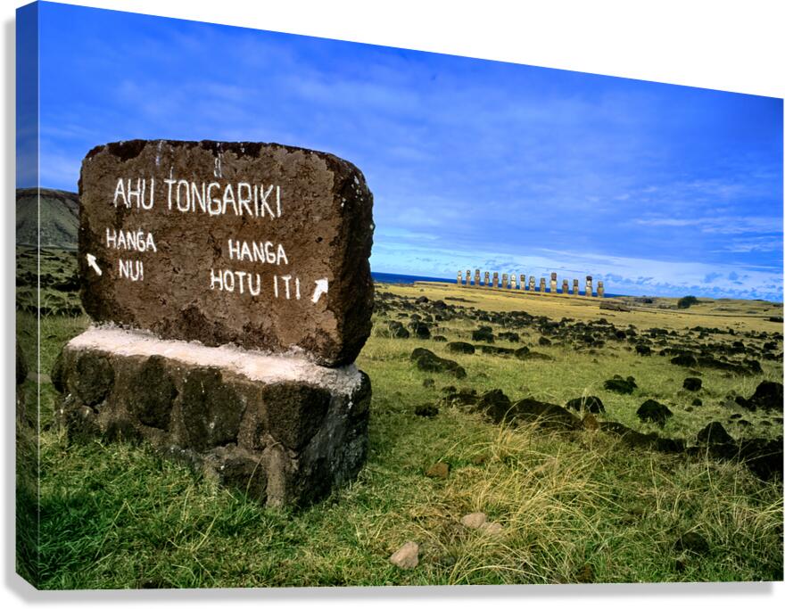 Easter Islands Ahu Tongariki Moai statues and directional sign. Canvas Print