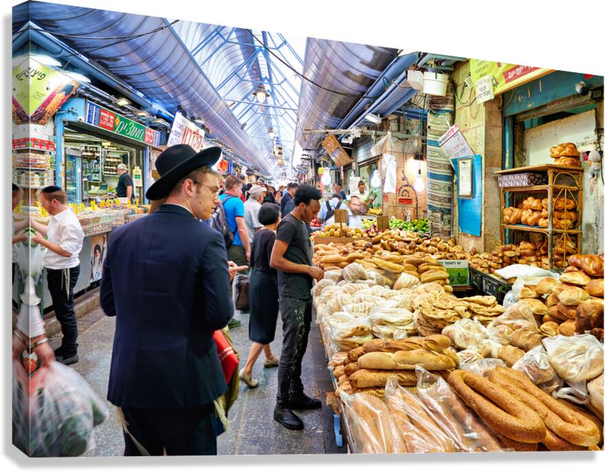 Visitors explore Mahane Yehuda Market in Jerusalem during daytim Canvas Print