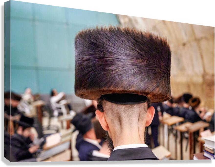 Jewish men study in Jerusalem at the Western Wall Canvas Print