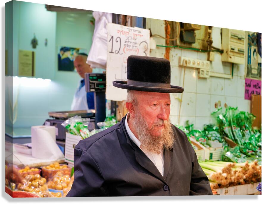 Elderly man in Mahane Yehuda Market in Jerusalem during a busy d Canvas Print