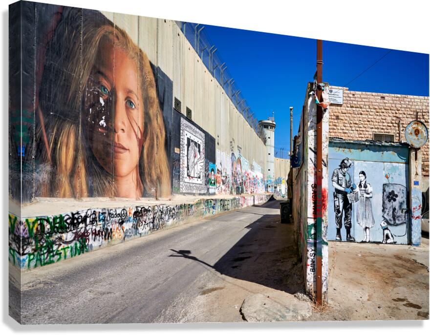 West Bank separation wall in Bethlehem shows murals and artwork Canvas Print
