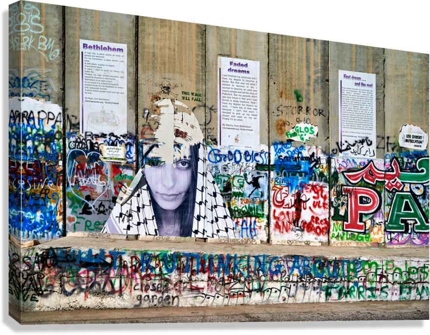 View of the separation wall in Bethlehem with graffiti and art Canvas Print