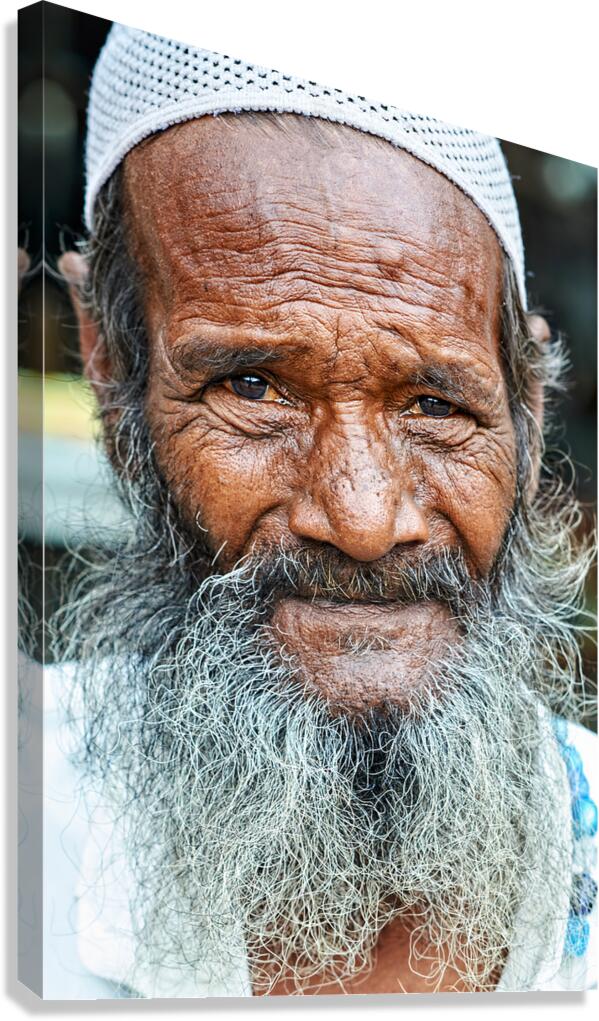 Old man in Rajasthan Jodhpur with a long beard and thoughtful ga Canvas Print