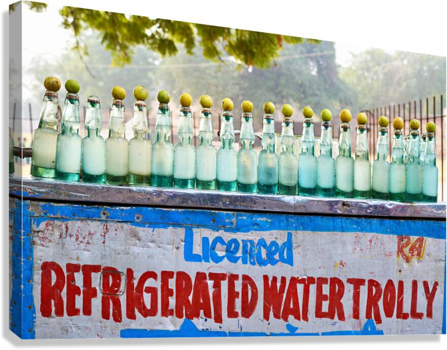 Selling refrigerated water bottles in Delhi India Canvas Print