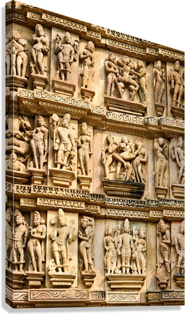 Hindu temples in Khajuraho with erotic carvings and sculptures Canvas Print
