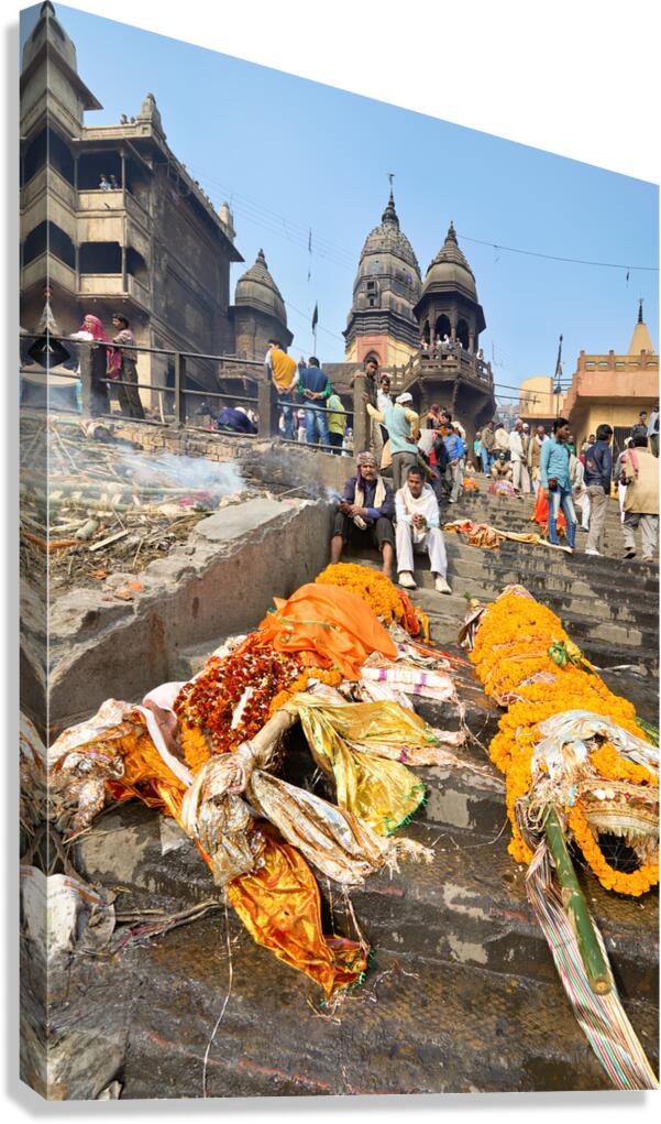 Cremation rites along the river Ganges in Varanasi India Canvas Print