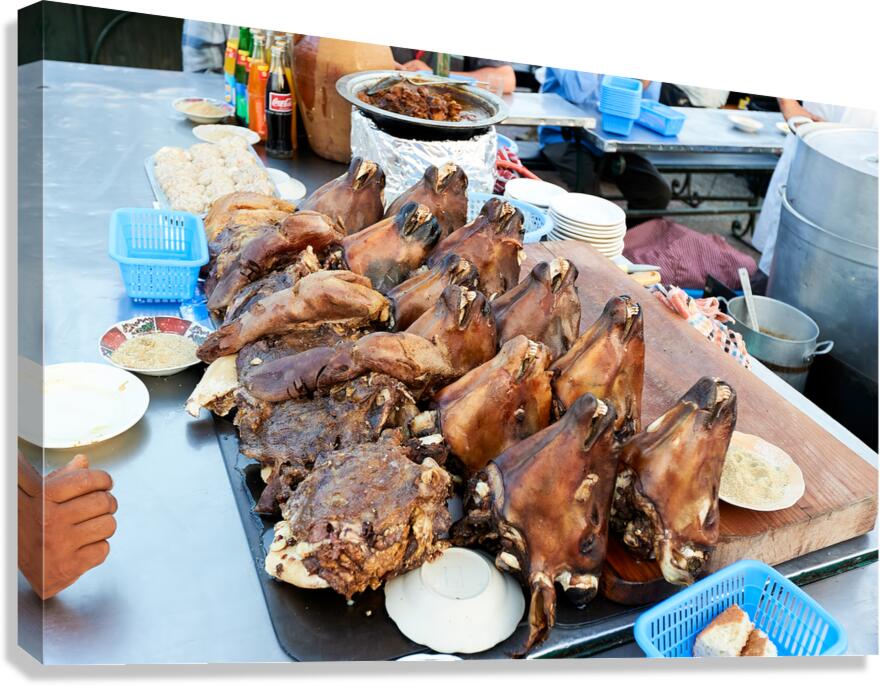 Goat heads ready to serve in Marrakeshs Djema el Fna Canvas Print