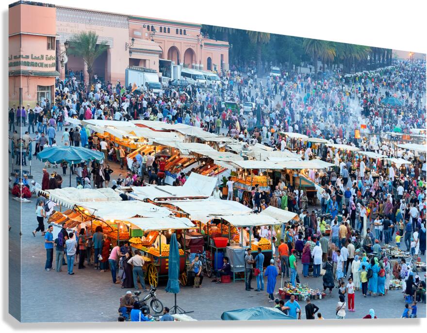 Sunset at Djema el Fna square in Marrakesh with lively crowds Canvas Print