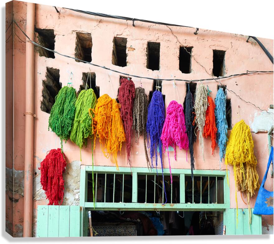 Hanging dyed threads in the dyers souk of Marrakesh Morocco Canvas Print