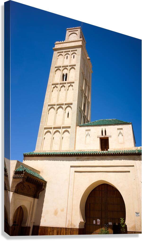 Visit Meknes mosque in Morocco with a tall tower and clear sky Canvas Print