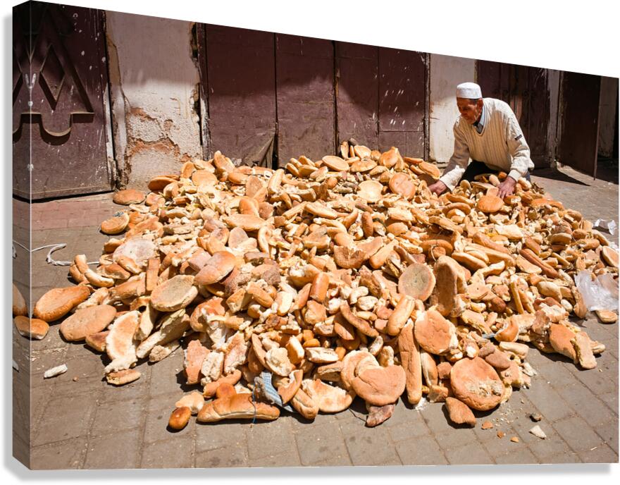 Collecting bread in Meknes Morocco during the day Canvas Print