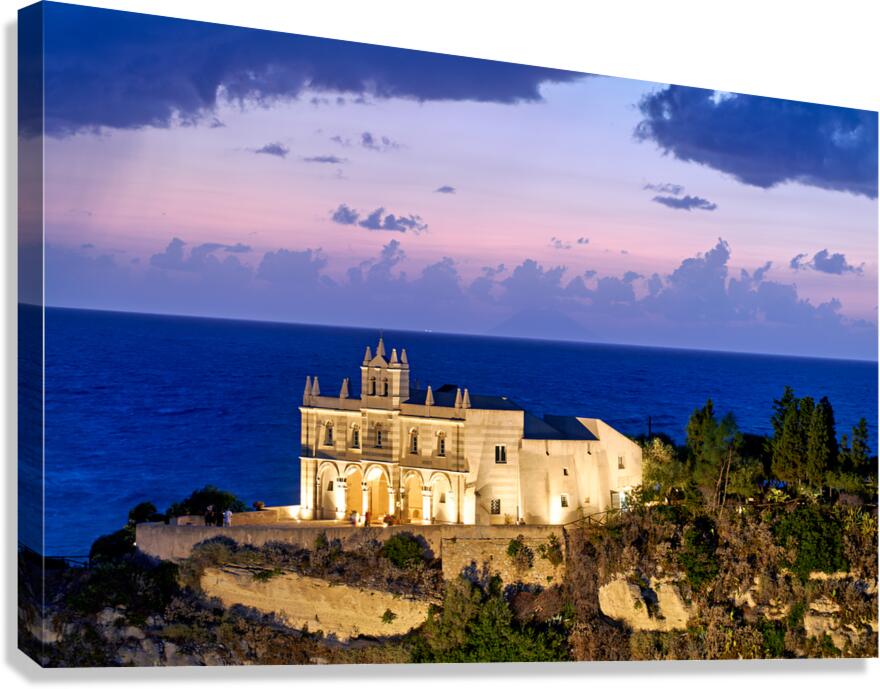 Tropea offers views of the sea and buildings at sunset in Calabr Canvas Print