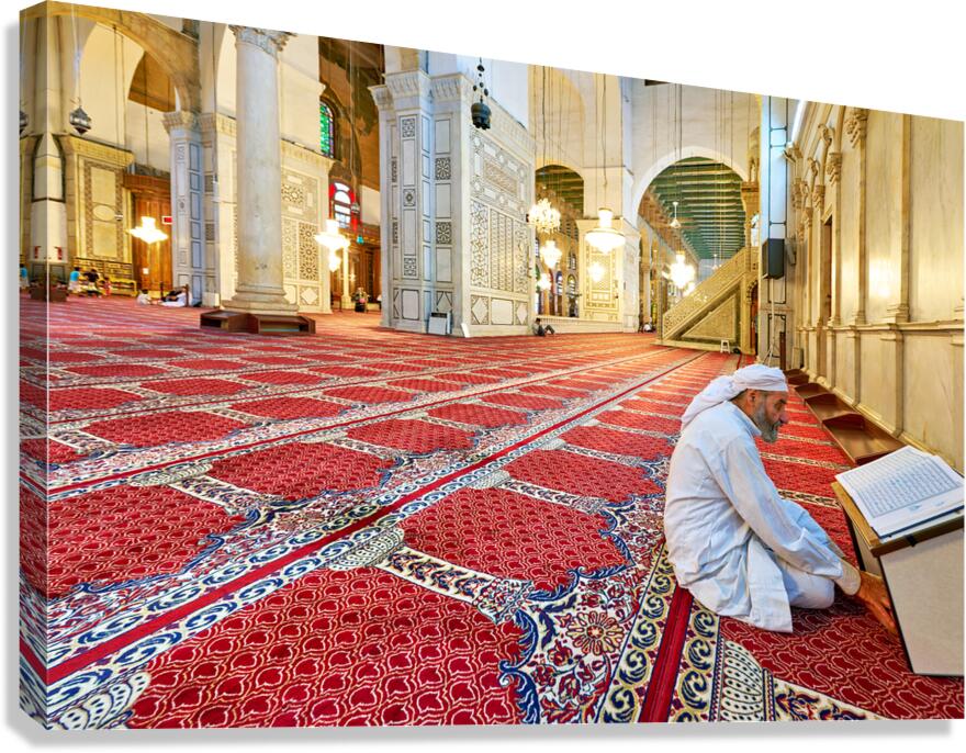 Visitor reading Quran in Umayyad Mosque in Damascus Canvas Print