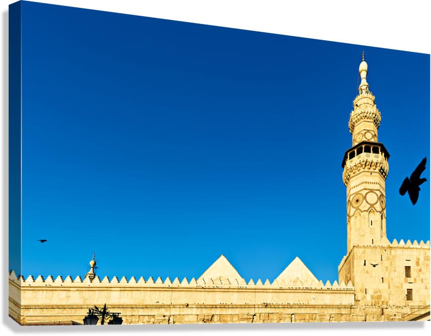 Mosque tower in Damascus against clear blue sky Canvas Print
