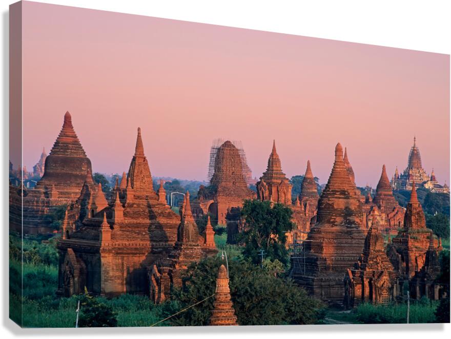 Temples in Bagan at dusk with a clear sky over Myanmar Canvas Print